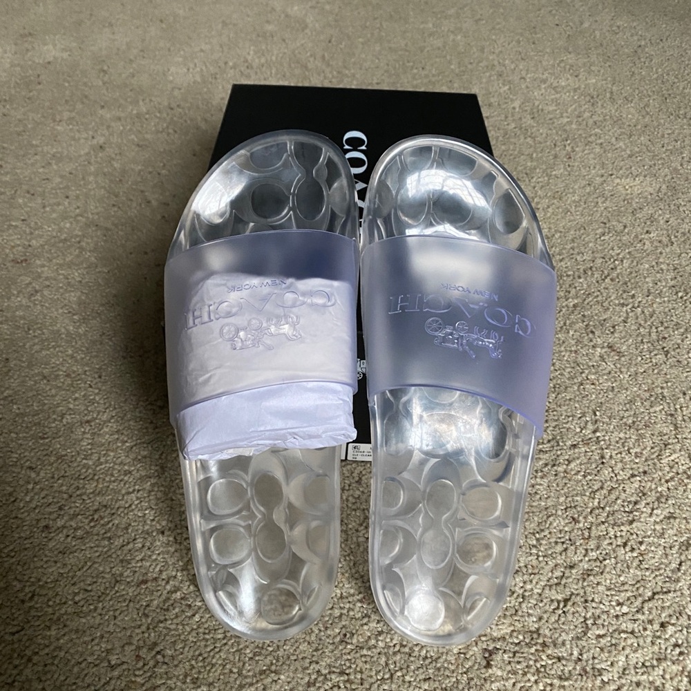 Brand new, never been worn Silver Coach Jelly Slides, size 9B